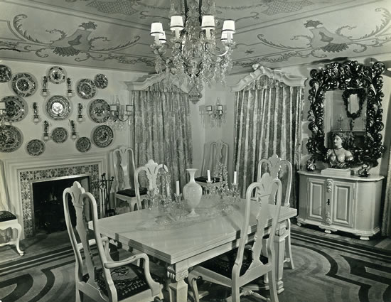 Dining room: Claggett Wilson designed the furniture,
rug, lighting, murals et cetera